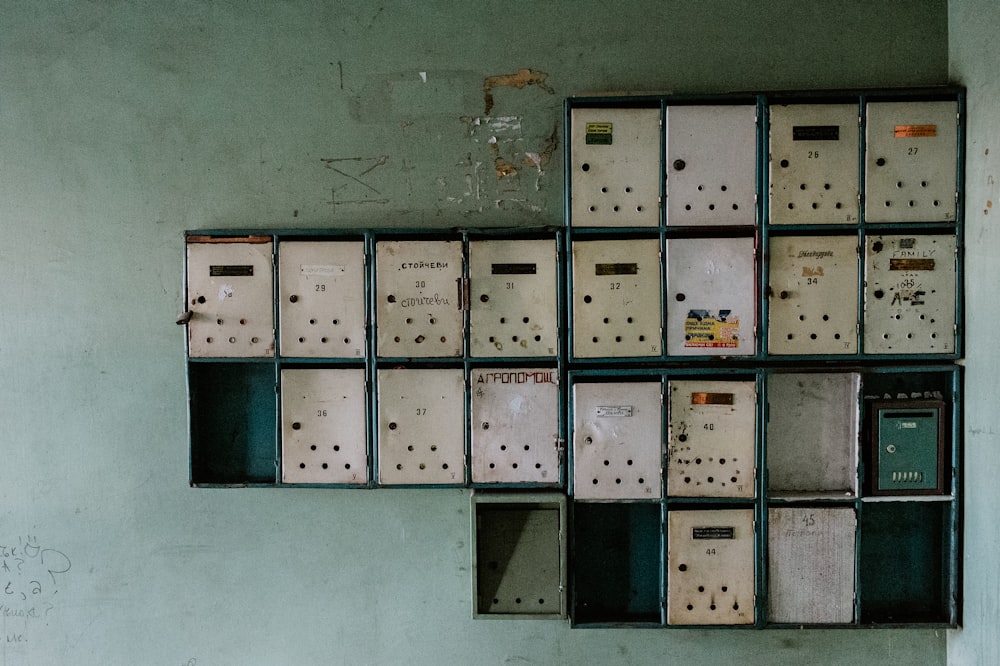 gray metal locker on gray concrete wall