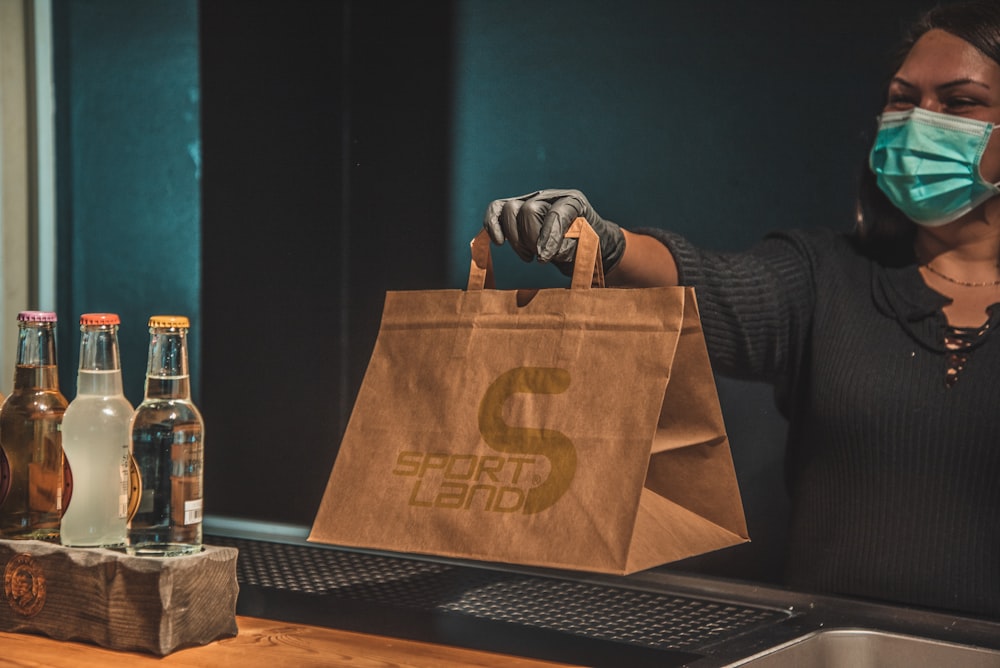 brown paper bag on brown wooden table