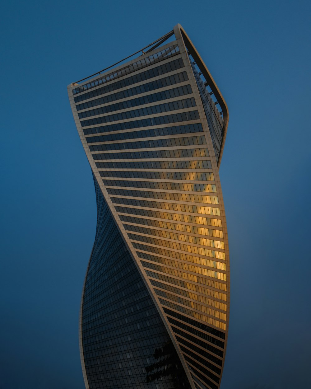 gray high rise building under blue sky during daytime