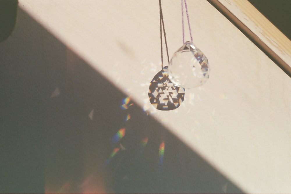 silver and black pendant necklace