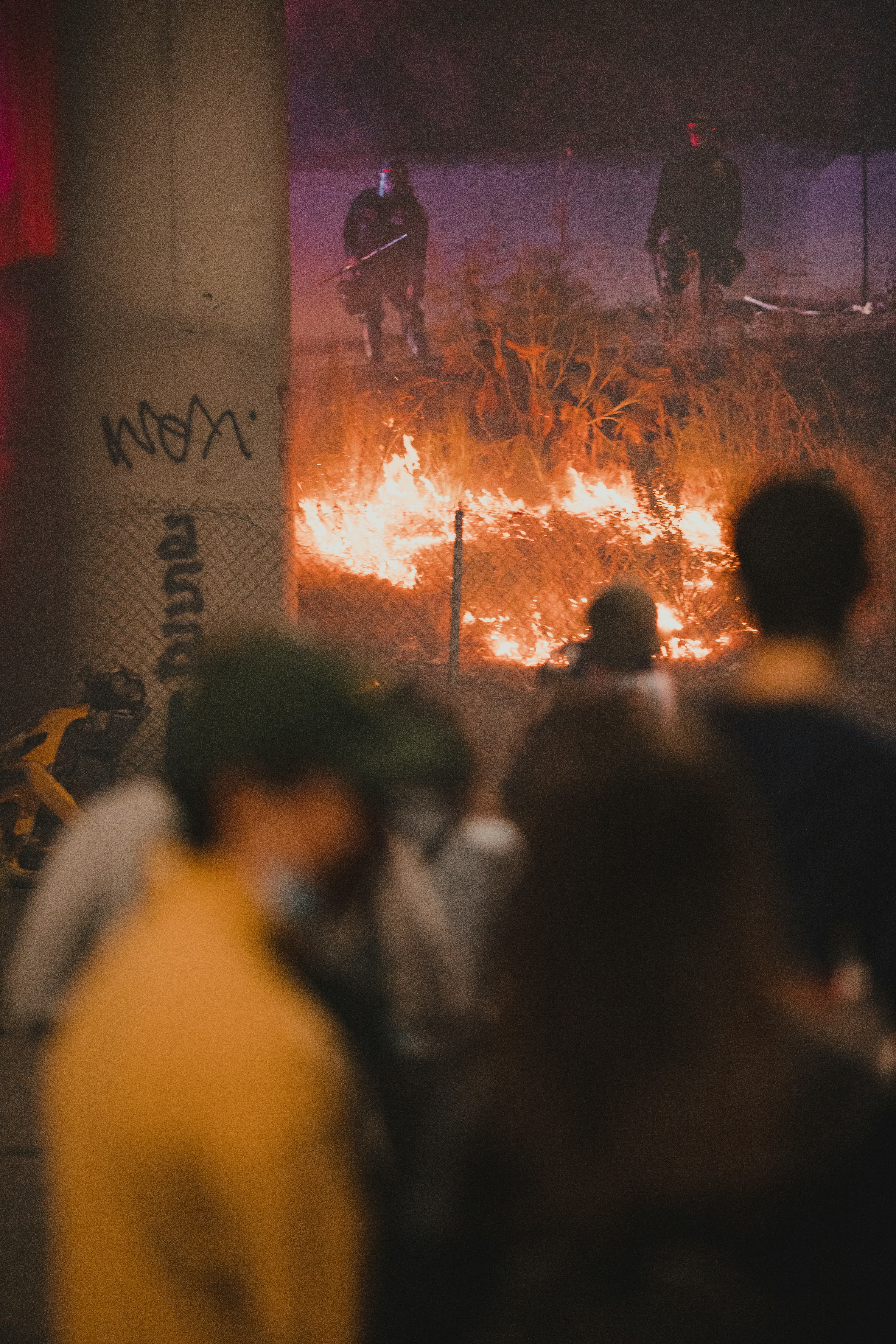 people standing on stage during night time