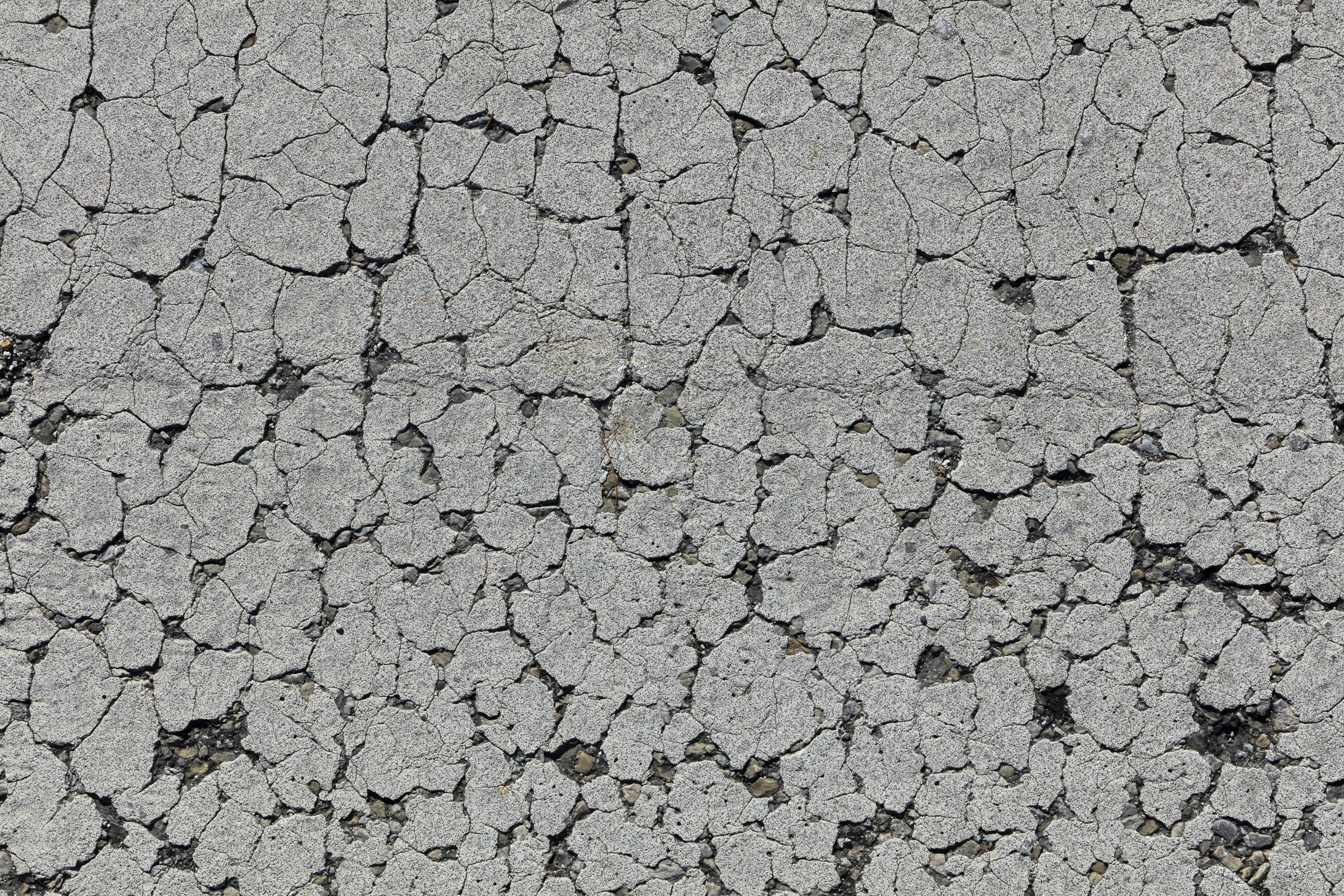 gray and black concrete pavement