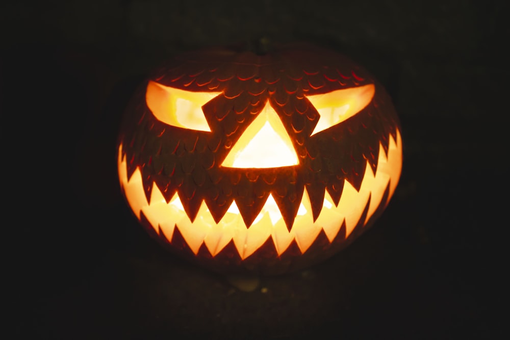 orange jack o lantern with light