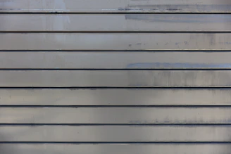 white and gray wooden wall
