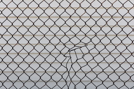 black metal chain link fence