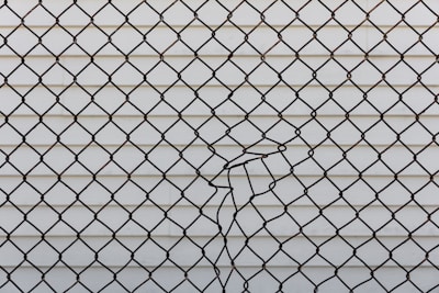 black metal chain link fence