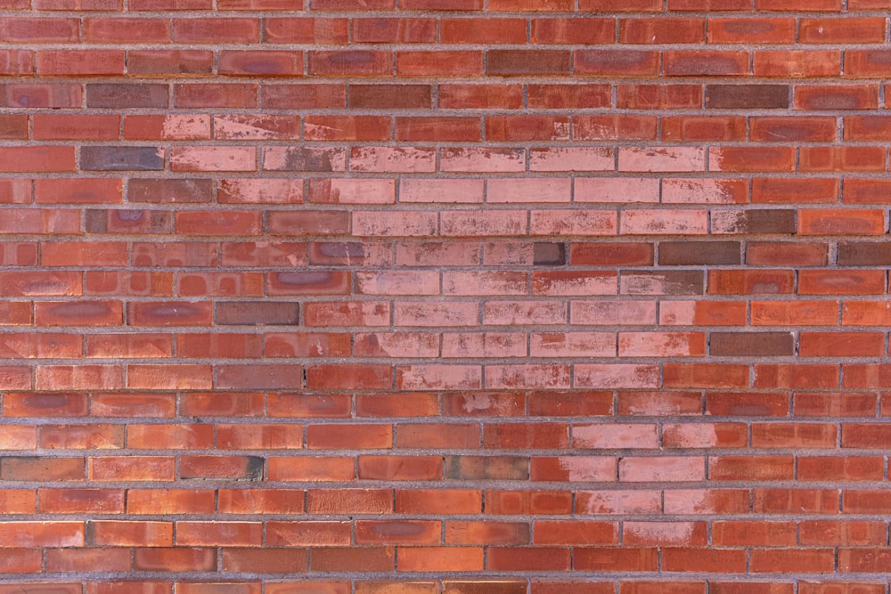 brown brick wall during daytime