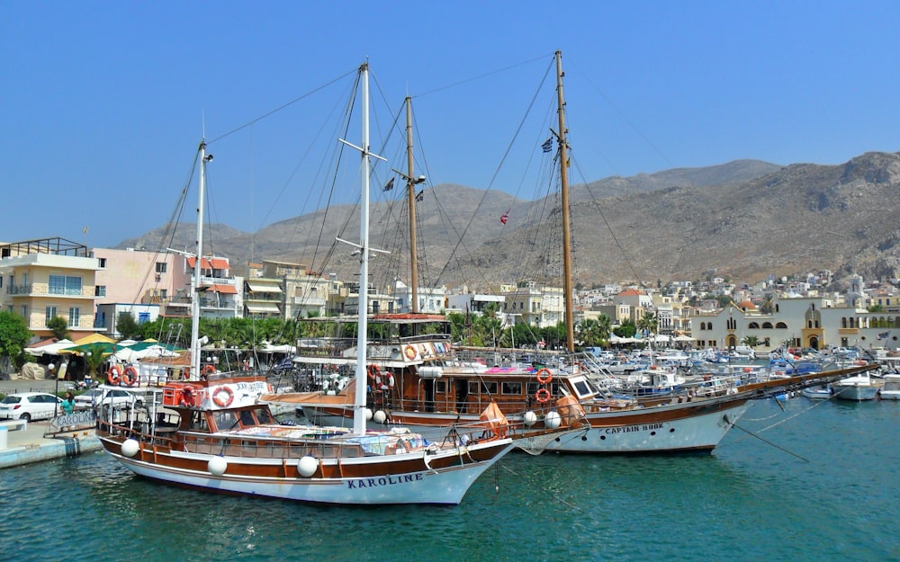 white and brown boat on sea during daytime