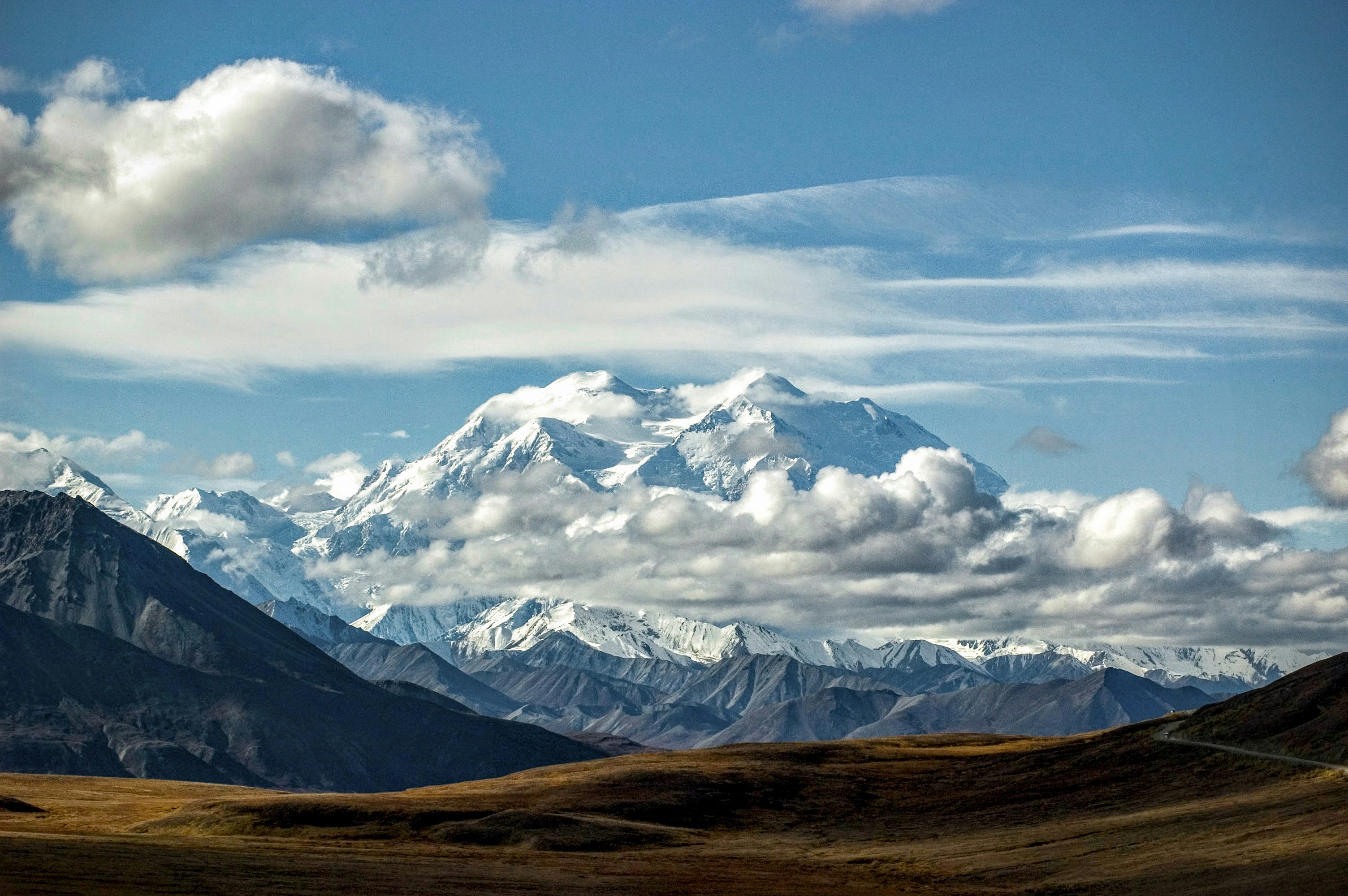 snow covered mountain under blue sky during daytime