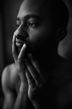 grayscale photo of topless boy