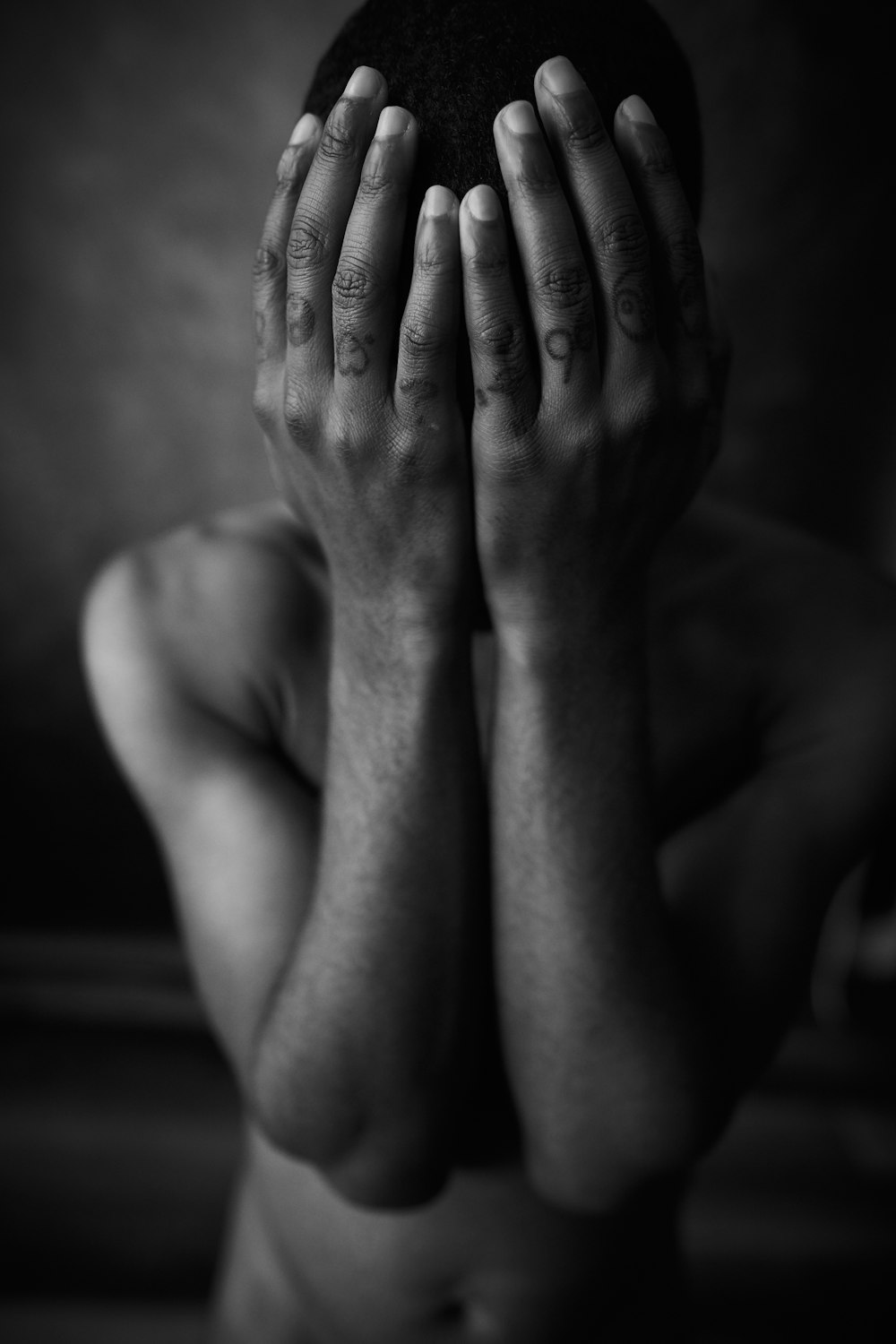 grayscale photo of persons hand