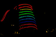 A collection of free spin icons and bonus symbols glowing on a dark background.