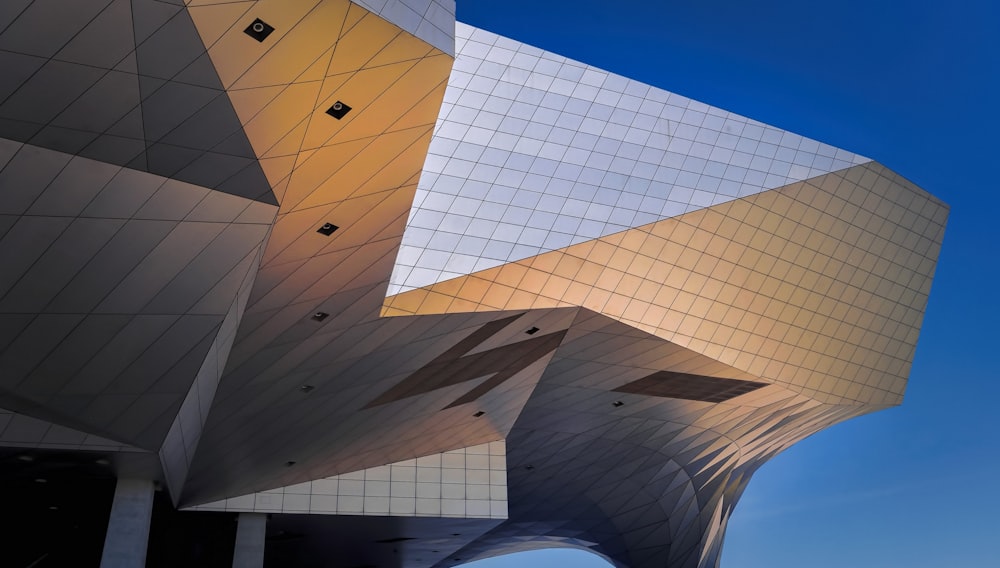 white concrete building under blue sky during daytime