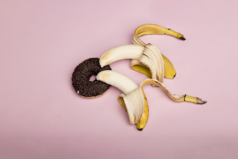 yellow banana fruit on white table