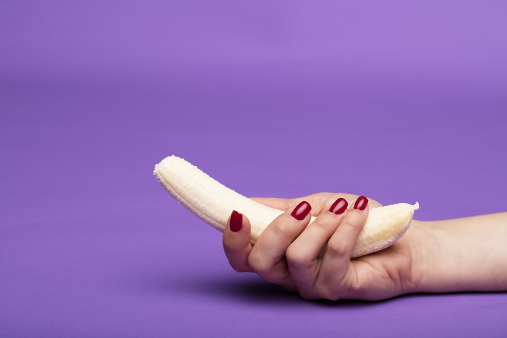 person holding sliced of bread