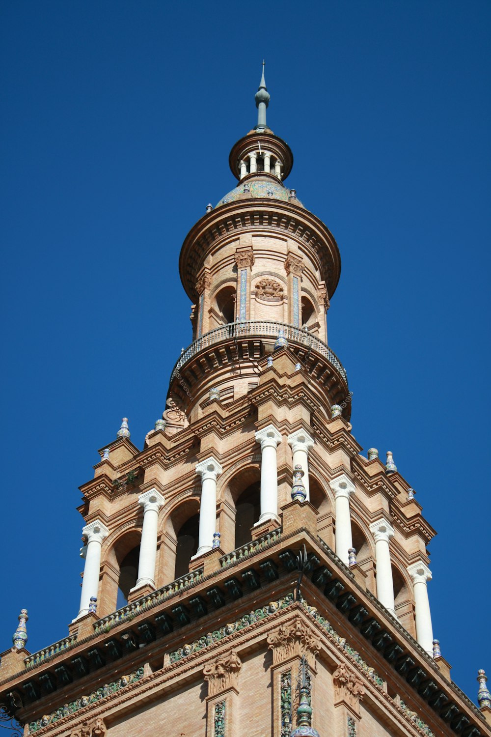 white concrete building under blue sky during daytime