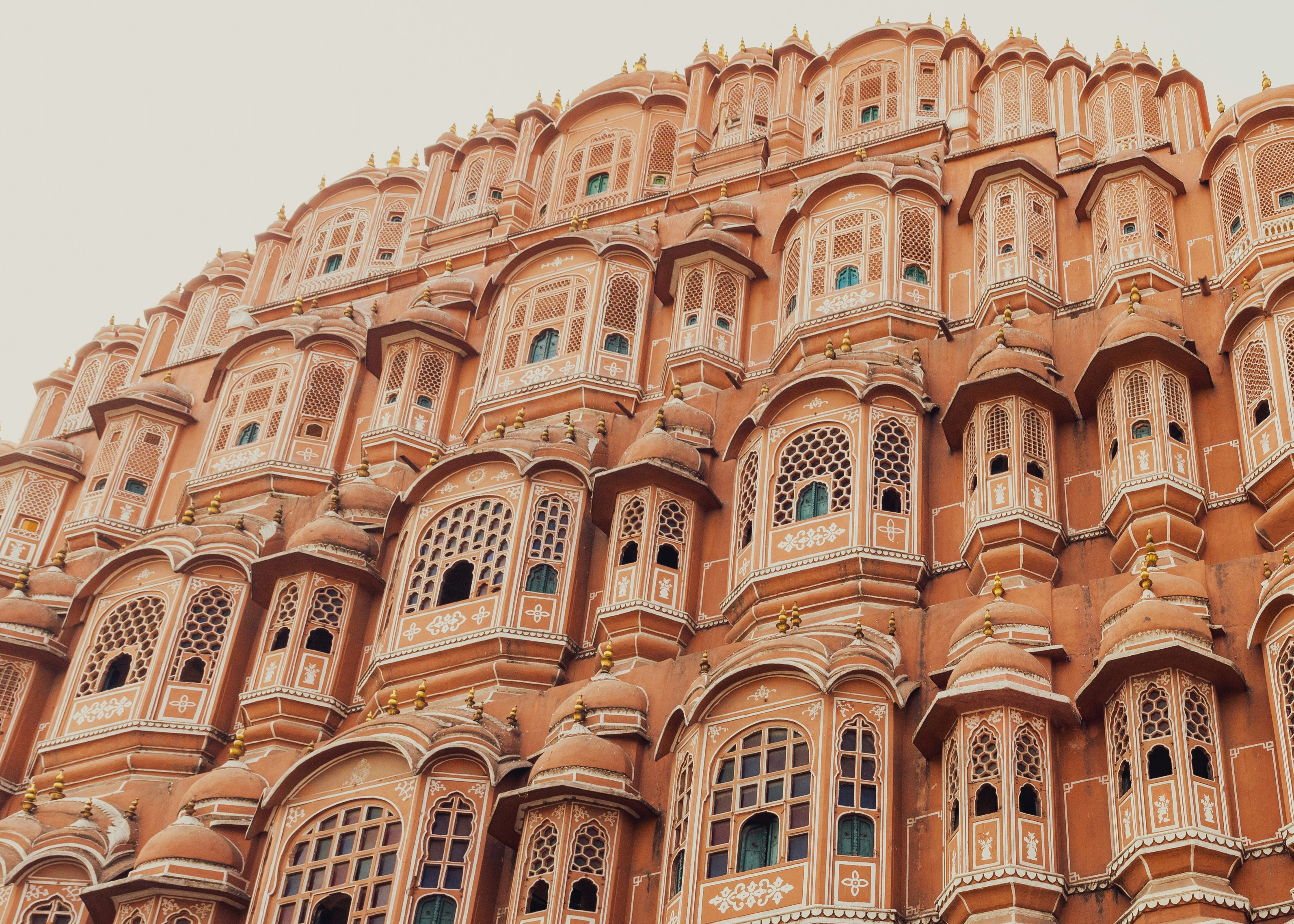 brown concrete building under white sky during daytime, 