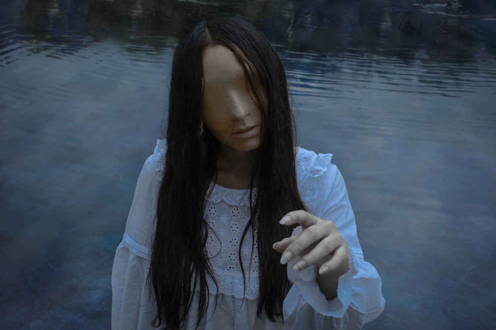 woman in white long sleeve shirt and blue denim jacket