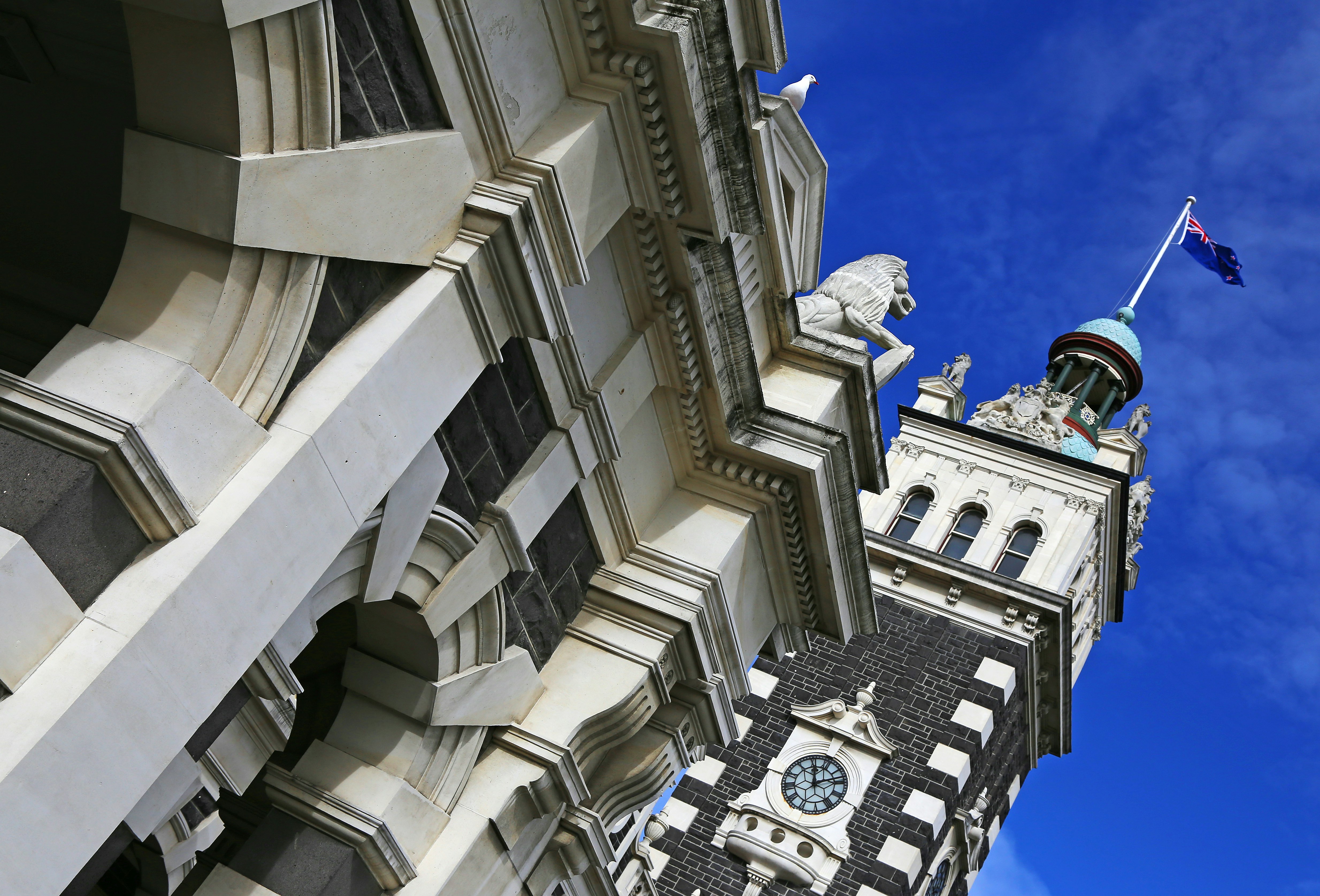 white concrete building under blue sky during daytime