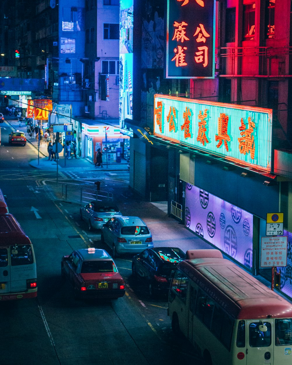 cars parked on street during night time