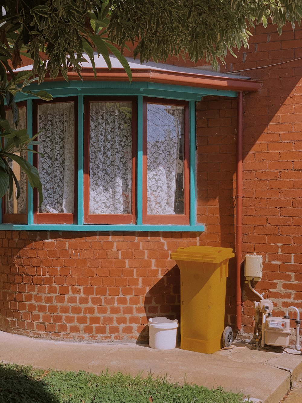 brown wooden framed glass window