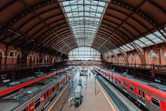 red and white train in train station