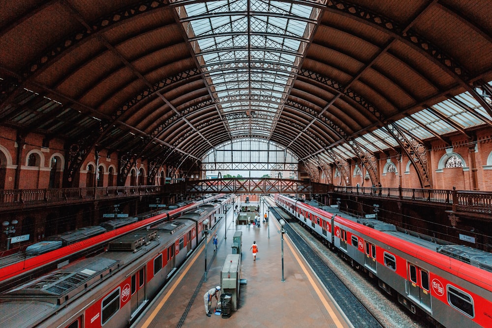 red and white train in train station