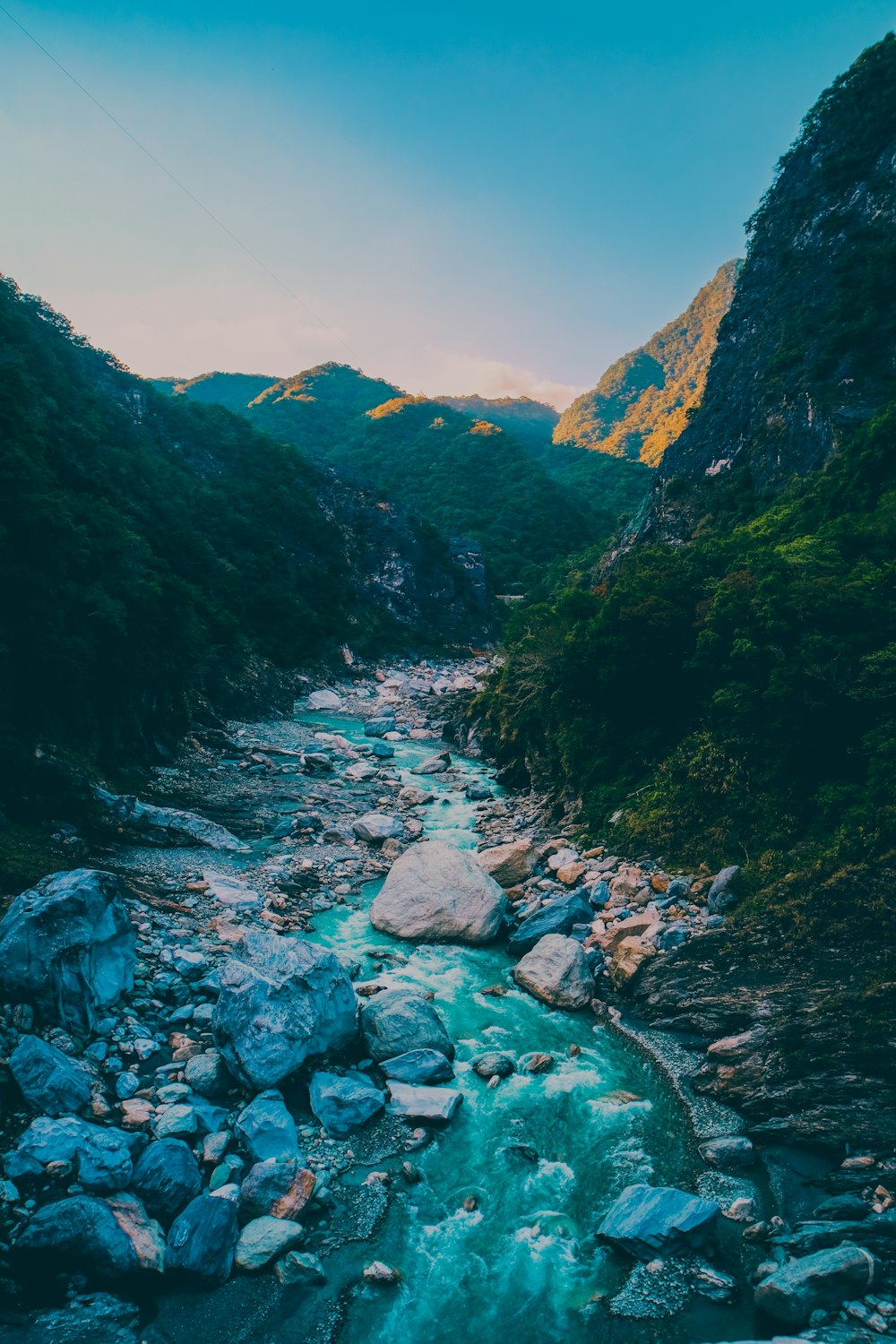 green mountains and river during daytime