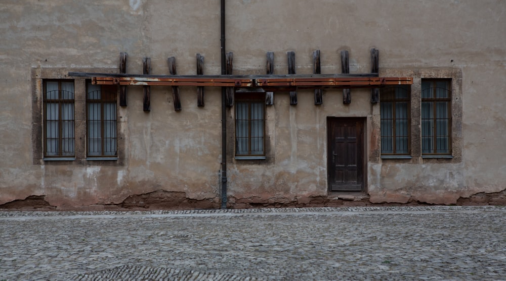 brown concrete building with window