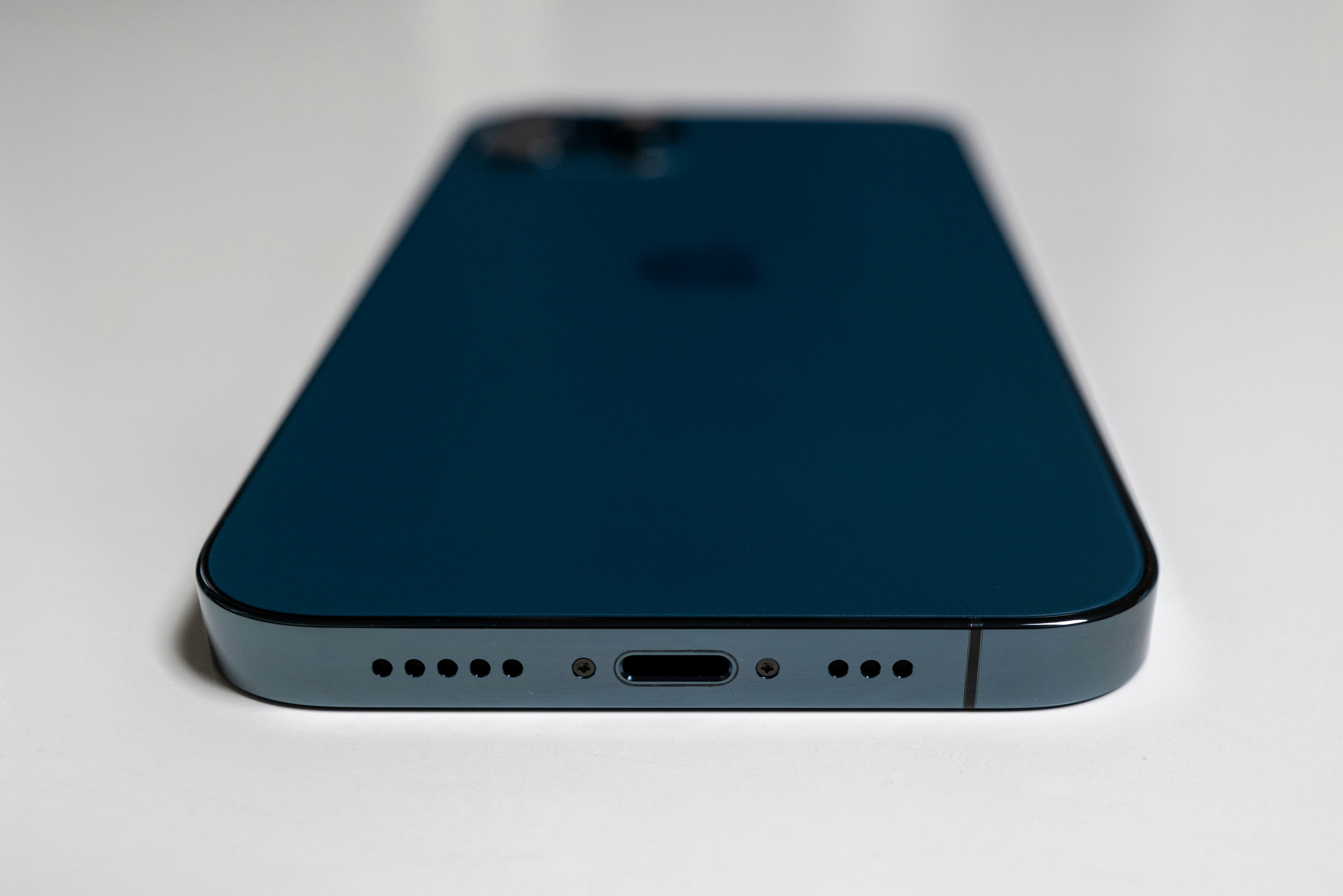 Black android smartphone on white surface photo – Free Blue Image on ...