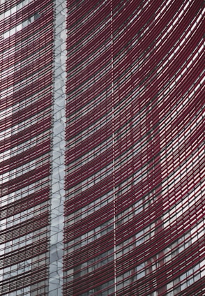 Modern aluminum facade installation on a commercial building by Smart Designer Construction.