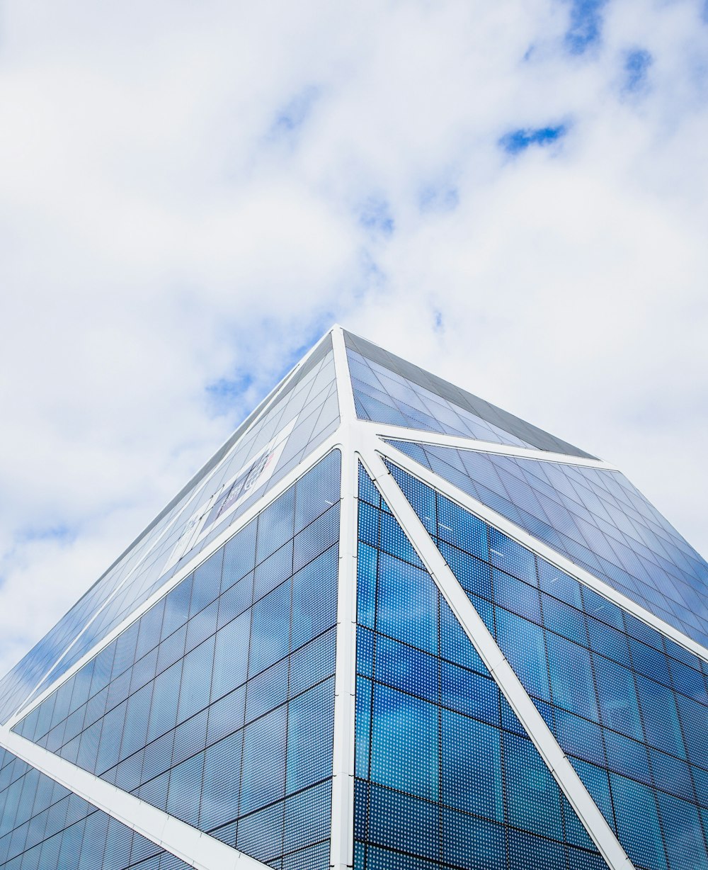 glass building under cloudy sky during daytime