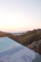 A scenic view of a famous landmark with a subtle overlay of data charts and travel plans.