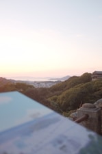 A scenic view of Balikpapan city with travel destinations marked on a map.