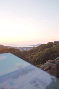 A scenic view of a famous landmark with a subtle overlay of data charts and travel plans.