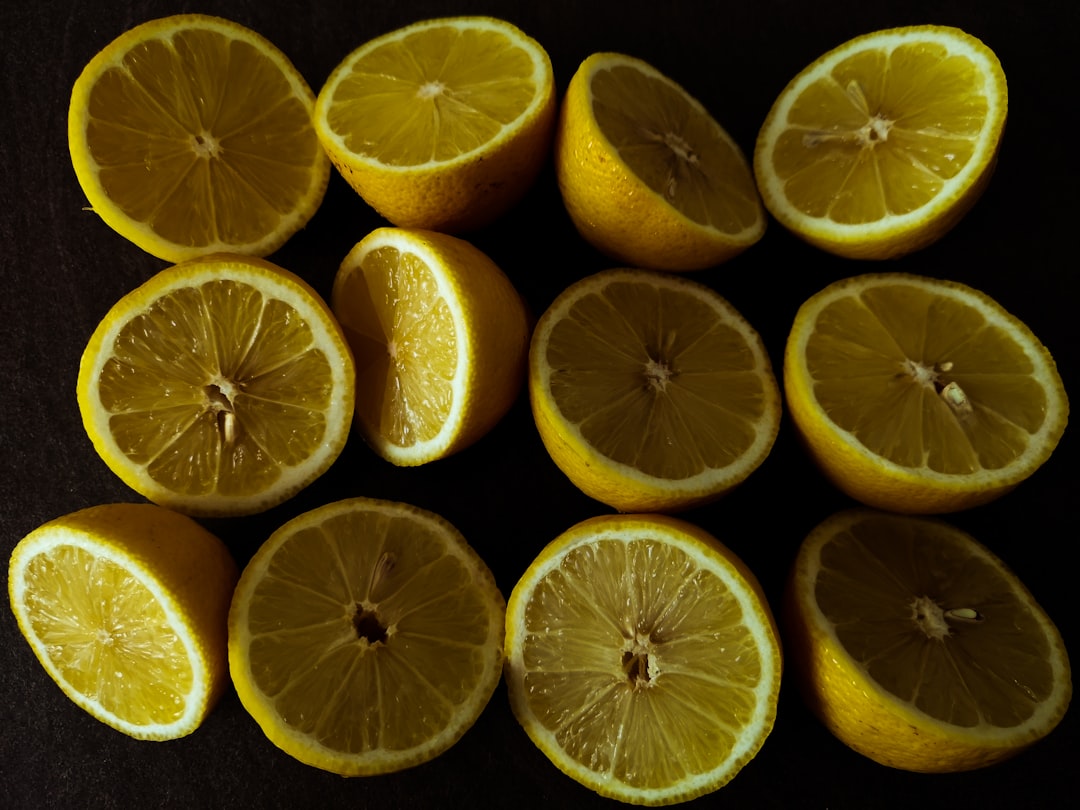 sliced lemon fruit on black background