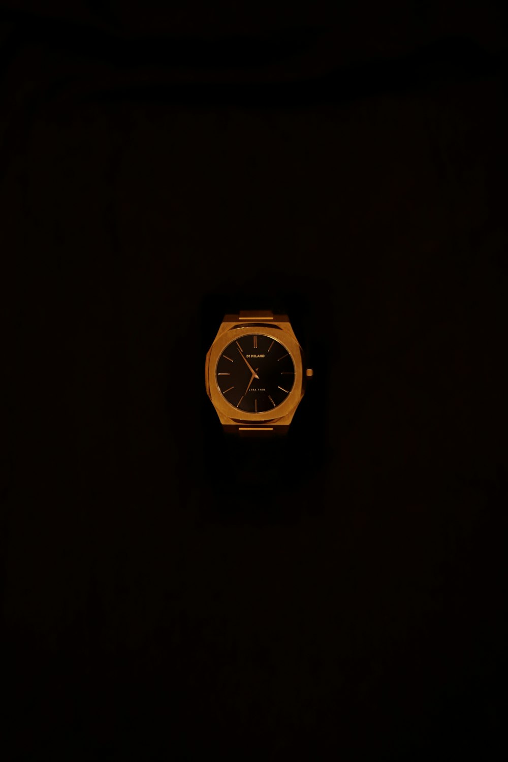 yellow and black analog watch