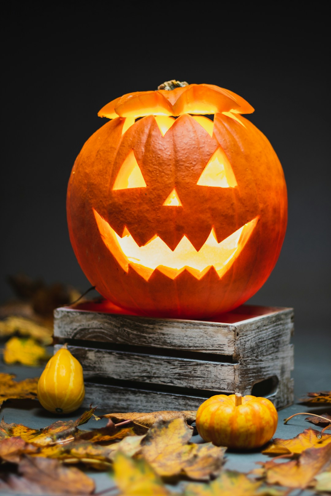 jack o lantern on brown wooden table