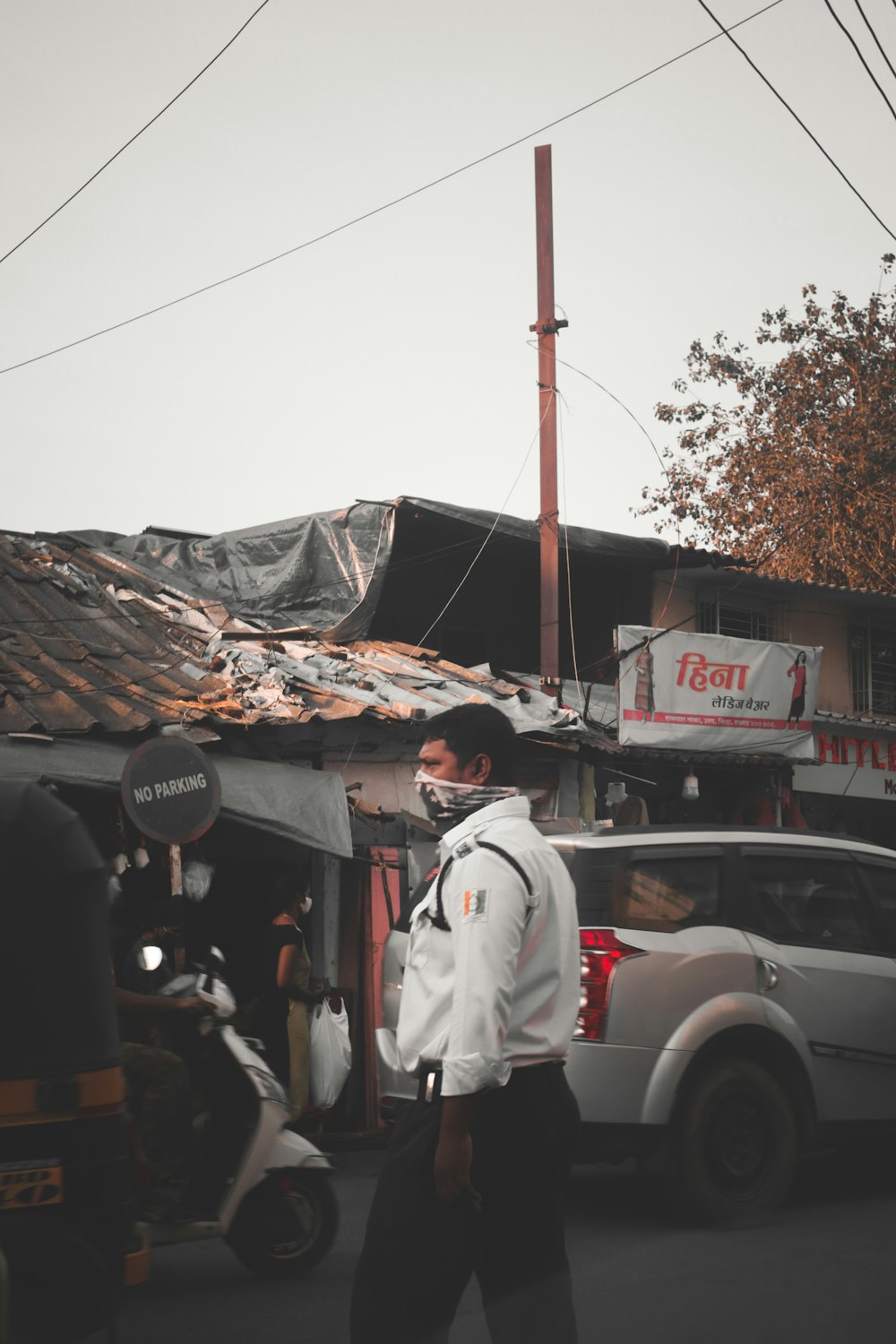 people standing near cars during daytime