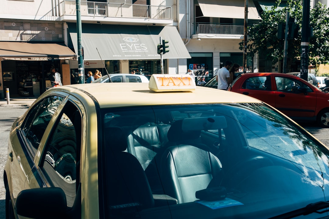 blue car with white and black car seat carrier