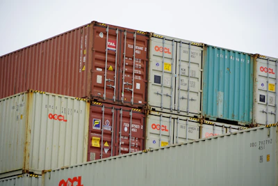 Pallets loaded with assorted household goods arranged for bulk sea freight.