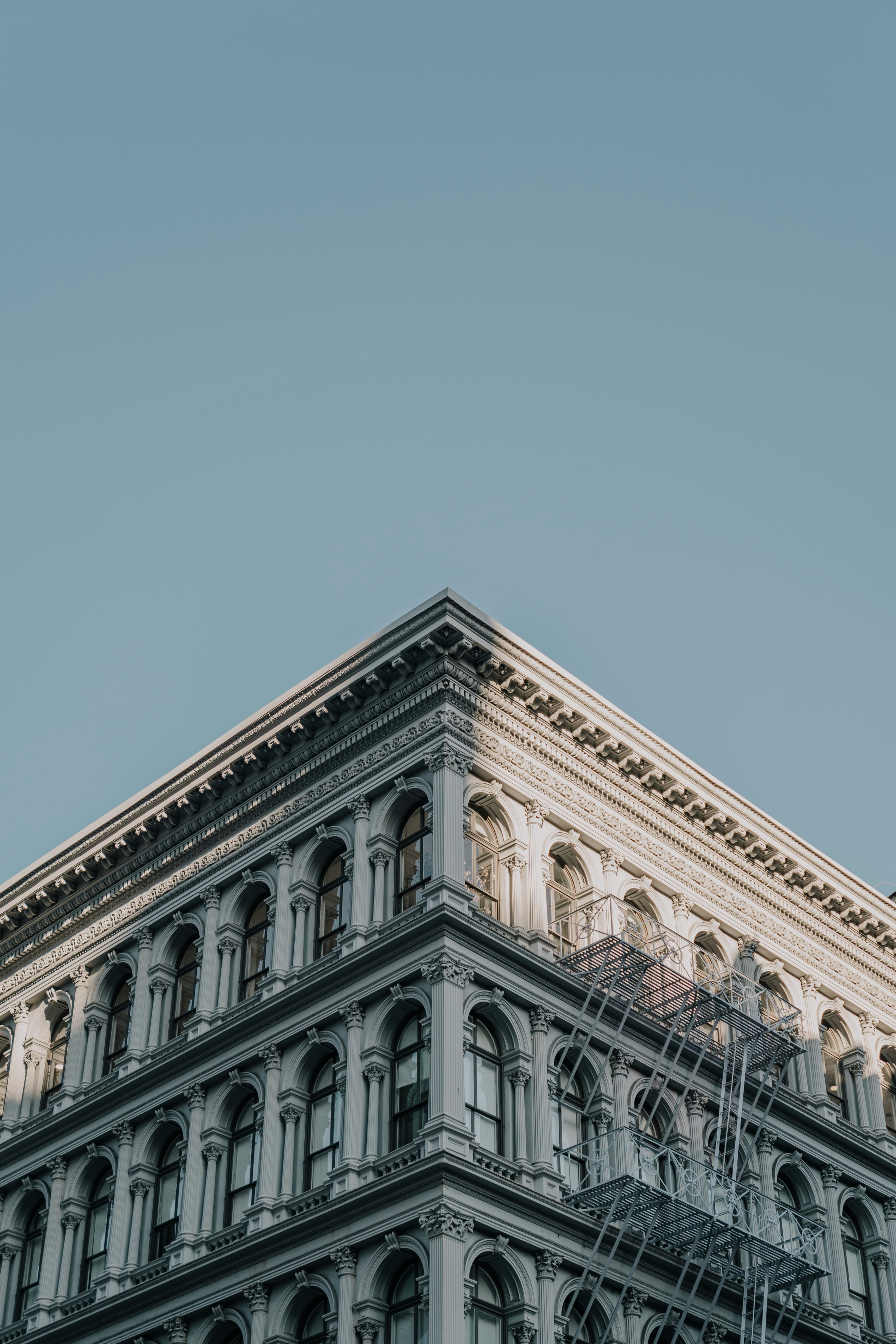 white concrete building under blue sky during daytime