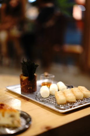Elegant premium pack of Emmuny Bites displayed on a wooden table with soft lighting.