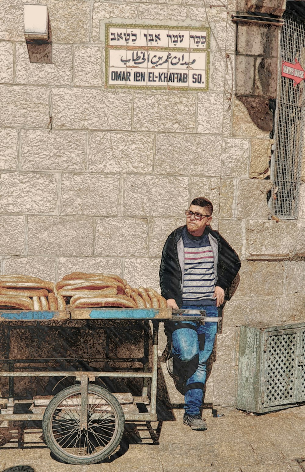 man in black and white striped long sleeve shirt and blue denim jeans standing beside brown