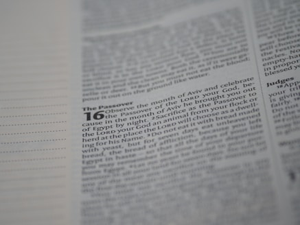 A close-up of a page from a religious text, focusing on passages related to the Passover with certain words highlighted in bold.