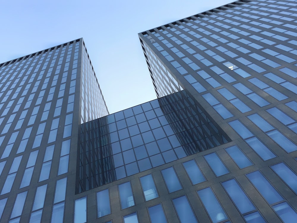 low angle photography of gray concrete building