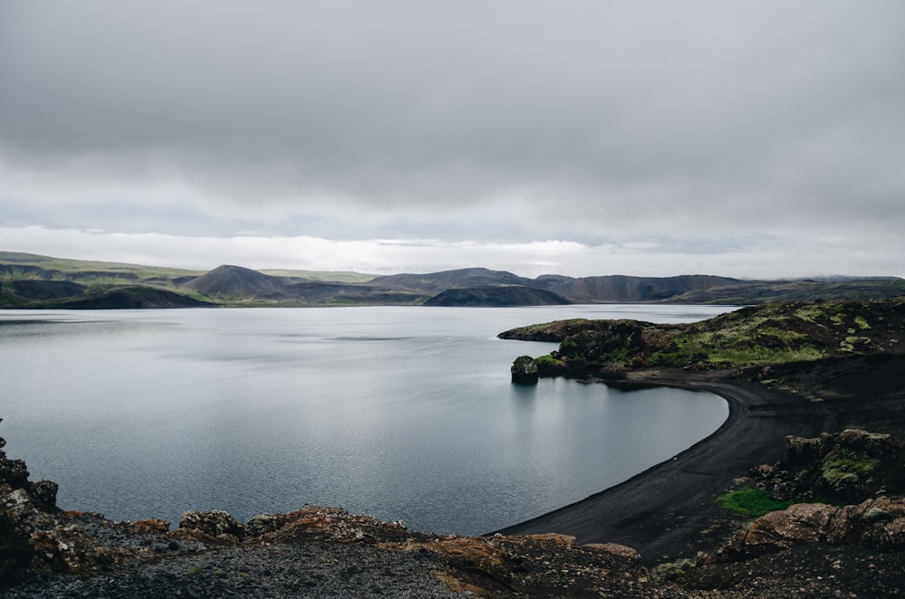 lake in the middle of mountains