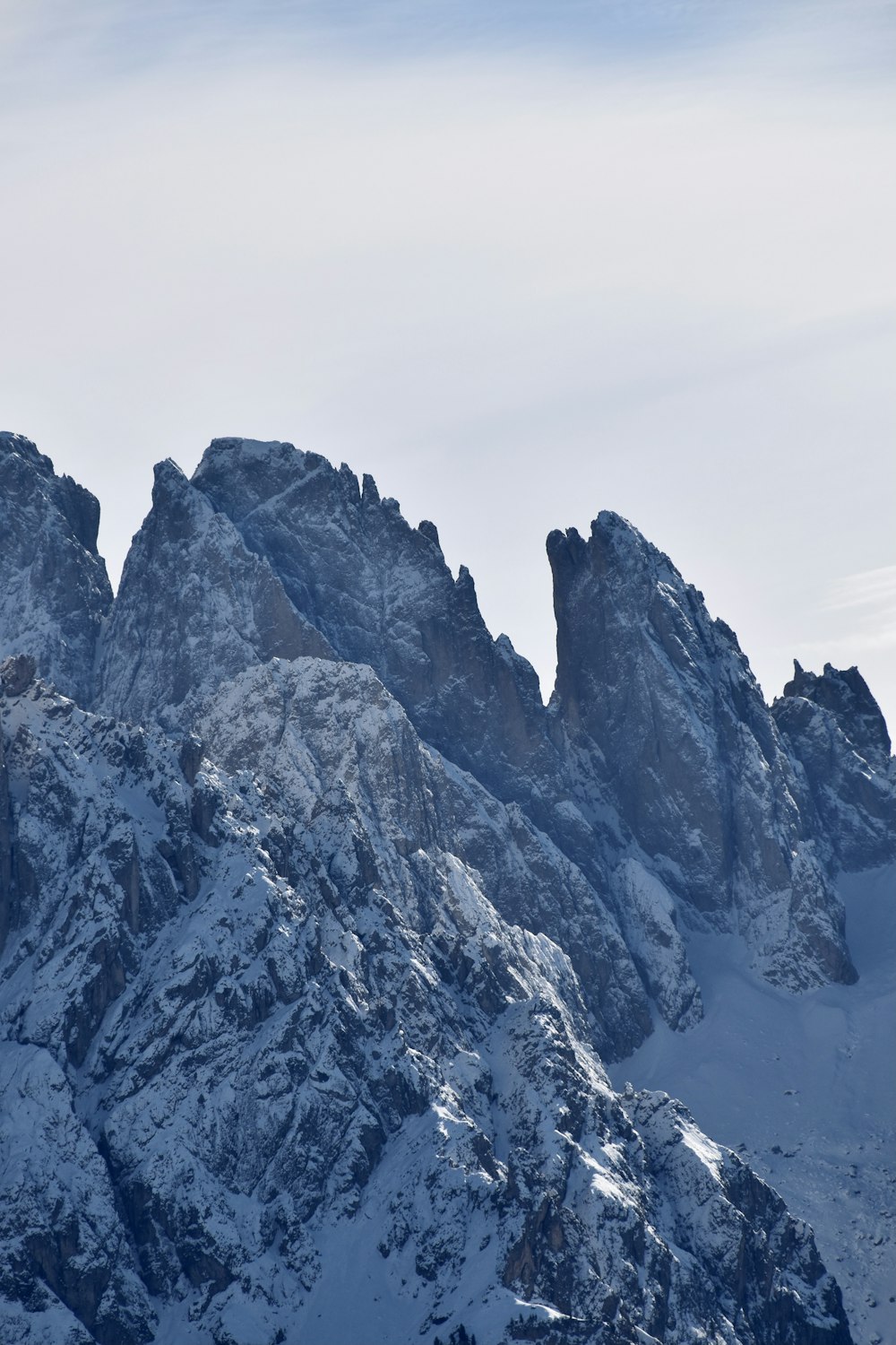 snow covered mountain during daytime