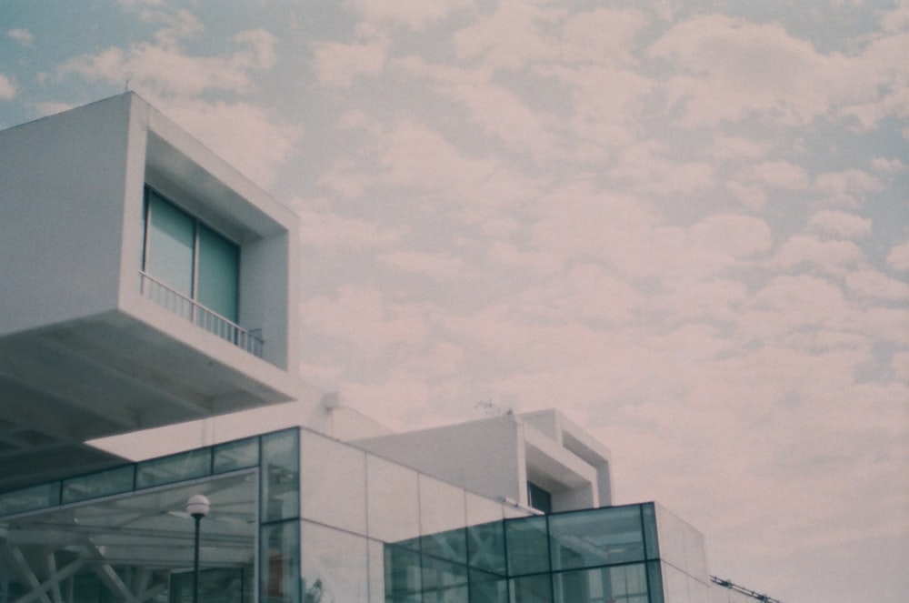 white concrete building under white sky during daytime