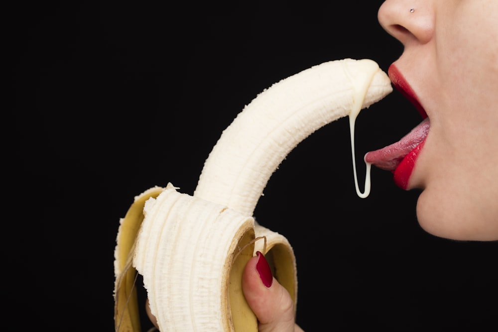 person holding yellow banana fruit